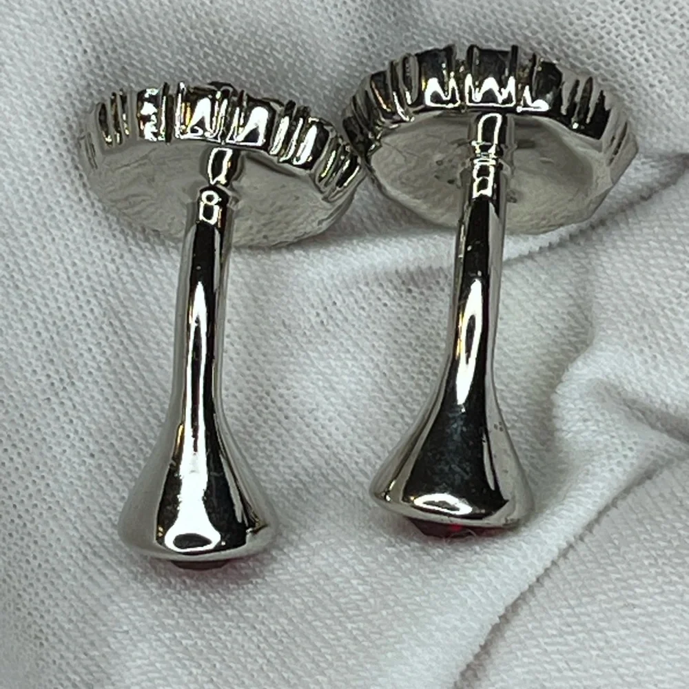 Cufflinks with St. George’s Cross pattern on green background